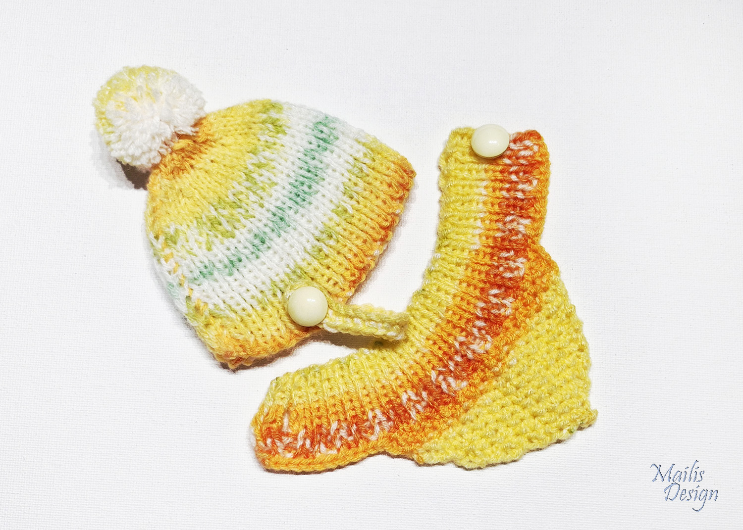 Nuku müts (pü 28cm) ja kaelussall, oranži kirju